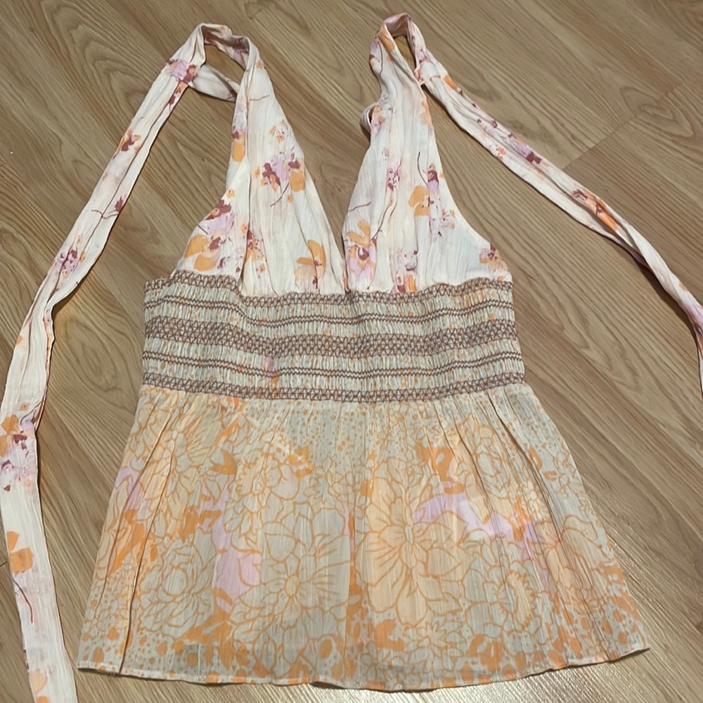 Free people top, size large but runs smaller